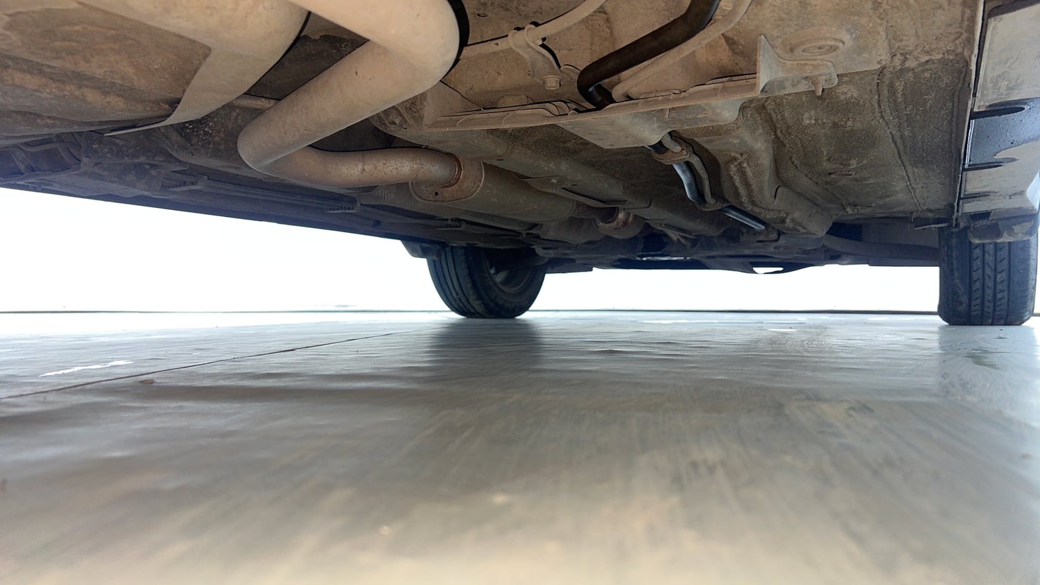 Used 2022 Kia Carens Prestige Plus 1.4 Petrol MT 7 STR Petrol Manual extra REAR RIGHT UNDERBODY VIEW