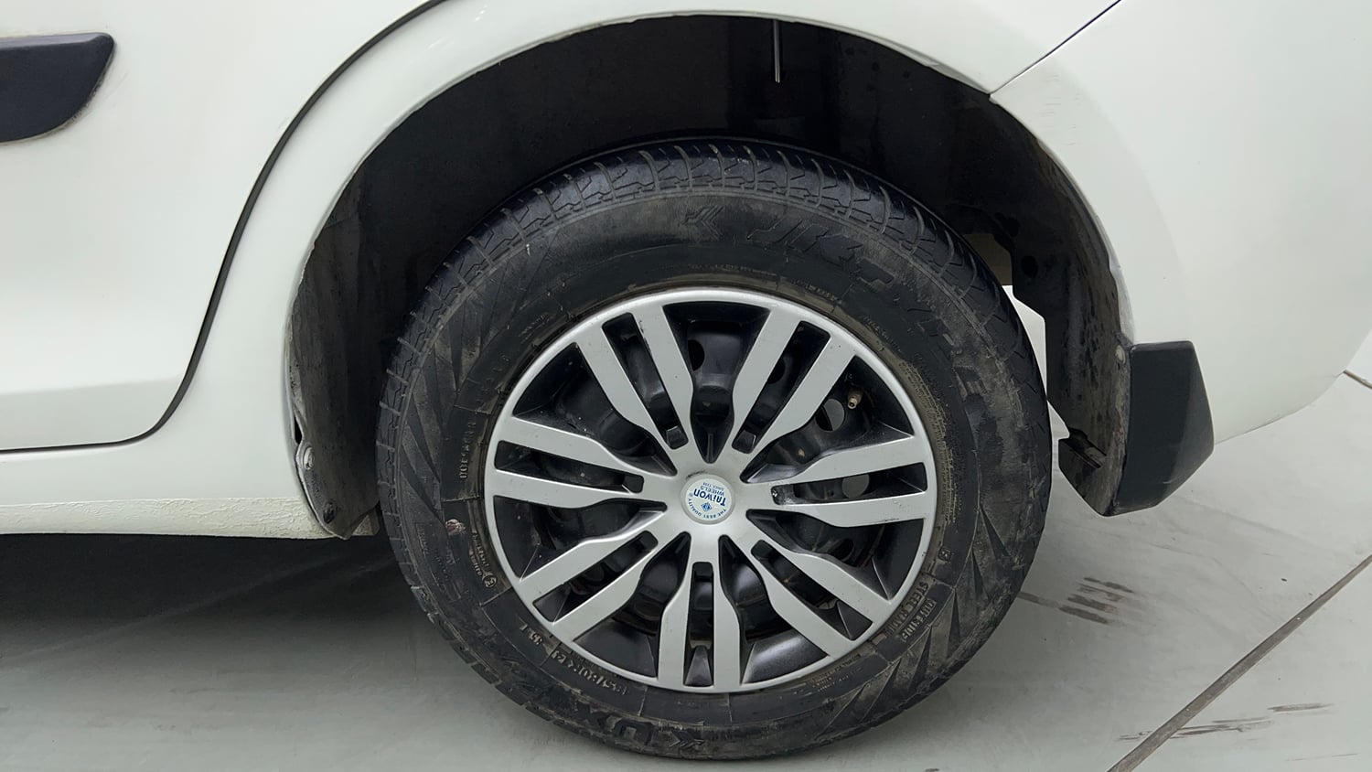 Used 2014 Maruti Suzuki Swift Dzire VXI Petrol Manual tyres LEFT REAR TYRE RIM VIEW