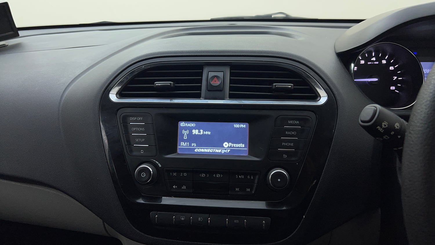 Used 2018 Tata Tiago Revotron XZ w/o Alloy Petrol Manual top_features Integrated (in-dash) music system