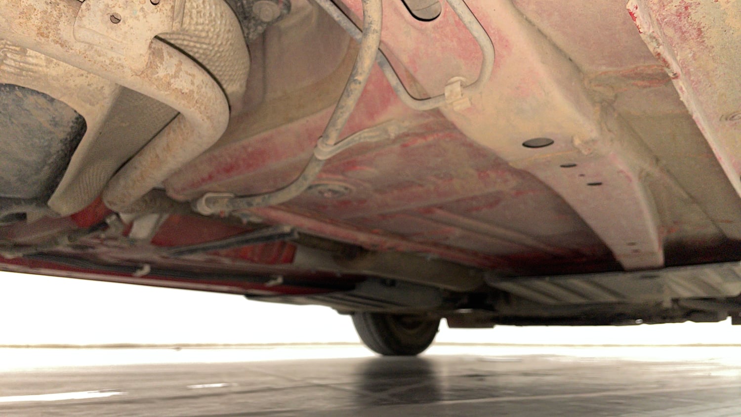 Used 2022 Maruti Suzuki Swift VXi AMT Petrol Automatic extra REAR RIGHT UNDERBODY VIEW