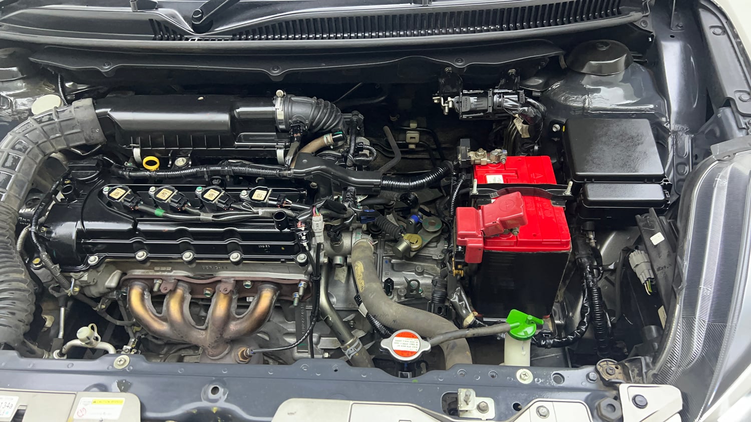 Used 2021 Maruti Suzuki Baleno Zeta Petrol Manual engine ENGINE LEFT SIDE VIEW