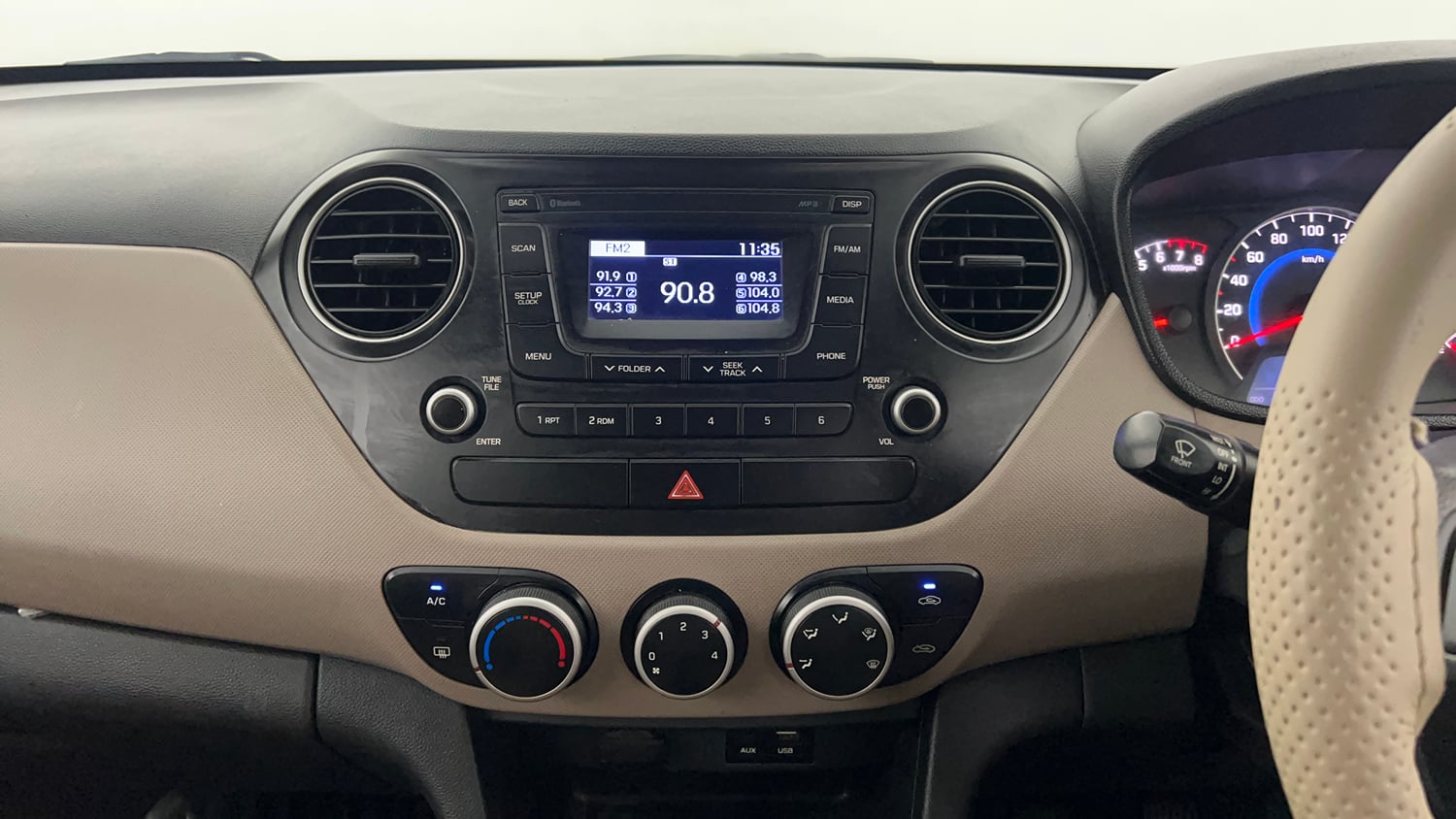 Used 2016 Hyundai Grand i10 Sportz 1.2 Kappa VTVT Petrol Manual interior MUSIC SYSTEM & AC CONTROL VIEW