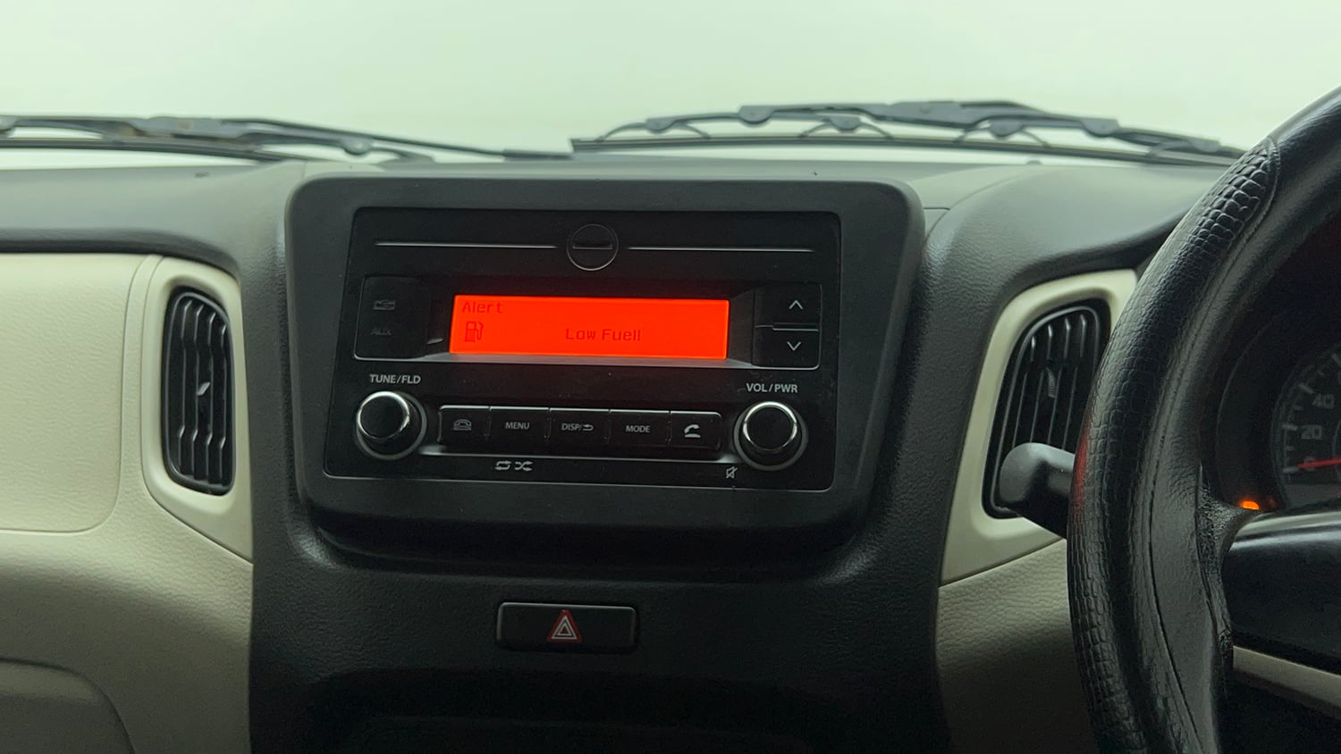 Used 2022 Maruti Suzuki Wagon R VXI 1.0 Petrol Manual top_features Integrated (in-dash) music system