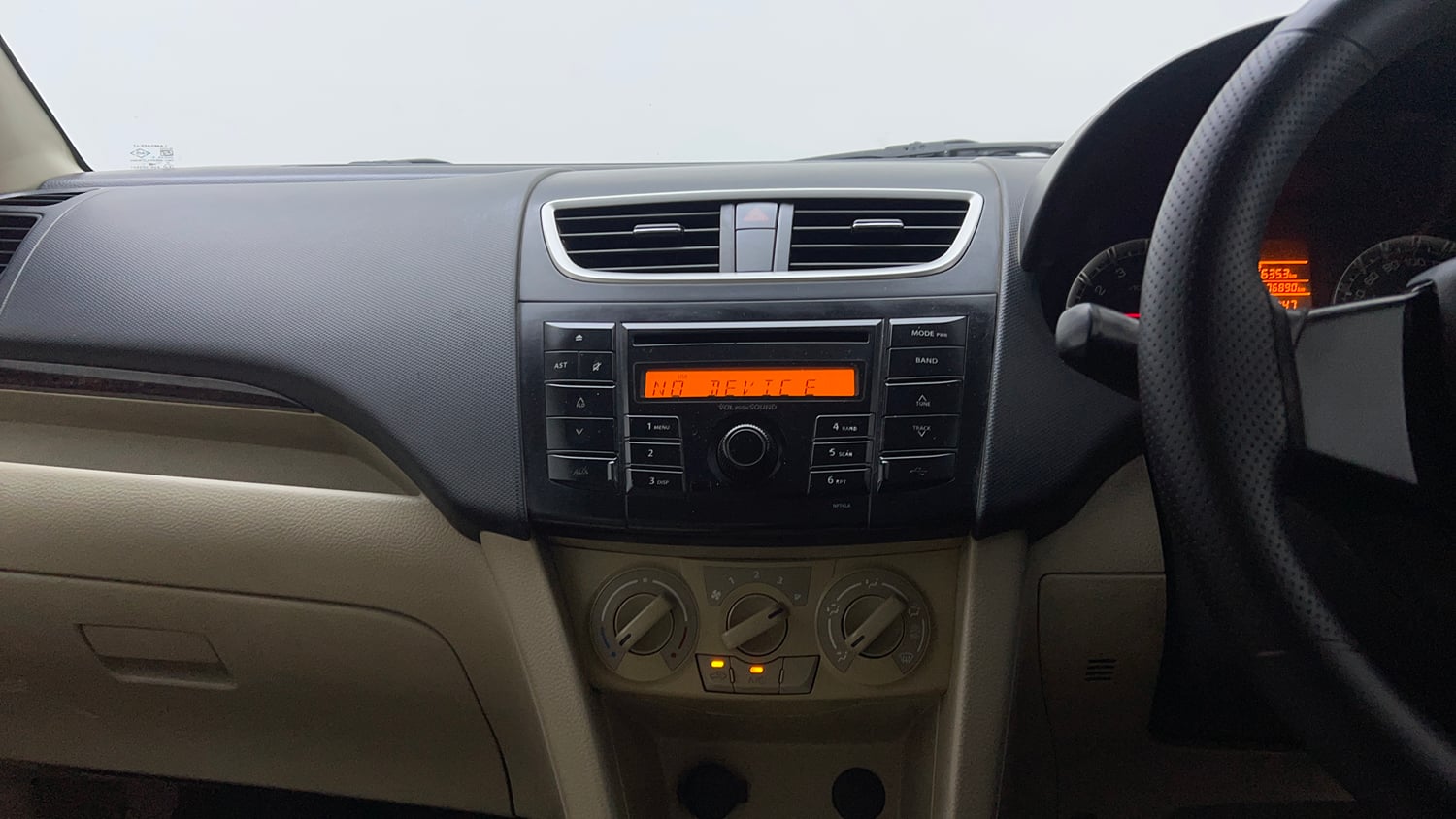 Used 2014 Maruti Suzuki Swift Dzire VXI Petrol Manual top_features Integrated (in-dash) music system