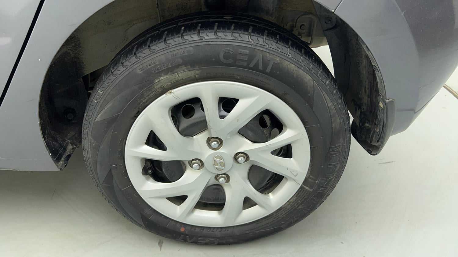 Used 2018 Hyundai Grand i10 Sportz 1.2 Kappa VTVT CNG (Outside Fitted) Cng Manual tyres LEFT REAR TYRE RIM VIEW