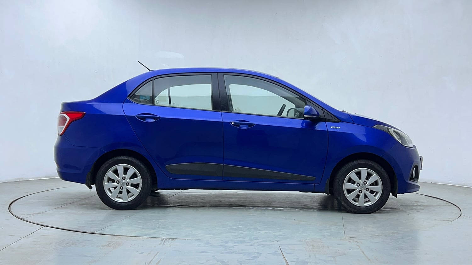 Used 2015 Hyundai Xcent S 1.2 (O) Petrol Manual exterior RIGHT SIDE VIEW