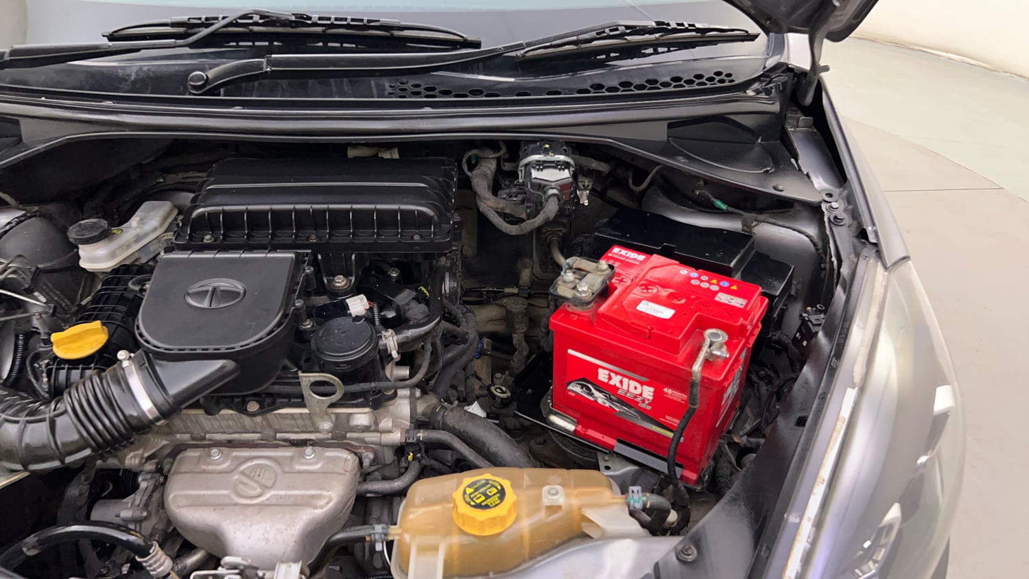 Used 2019 Tata Tigor Revotron XZ+ Petrol Manual engine ENGINE LEFT SIDE HINGE & APRON VIEW
