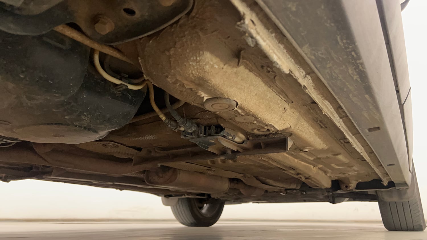 Used 2024 Volkswagen Taigun Topline 1.0 TSI AT Petrol Automatic extra REAR RIGHT UNDERBODY VIEW