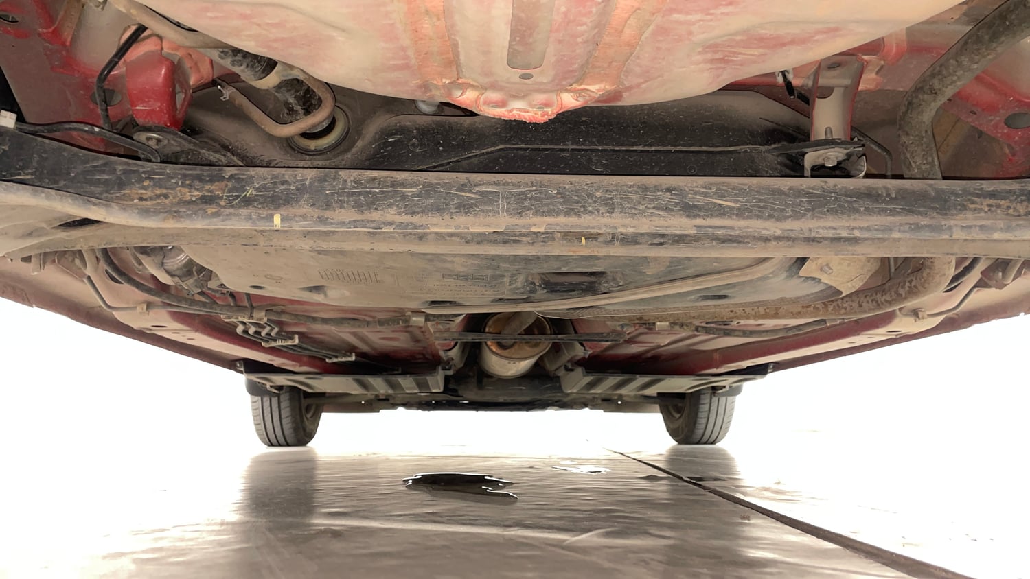 Used 2022 Maruti Suzuki Swift VXi AMT Petrol Automatic extra REAR UNDERBODY VIEW (TAKEN FROM REAR)