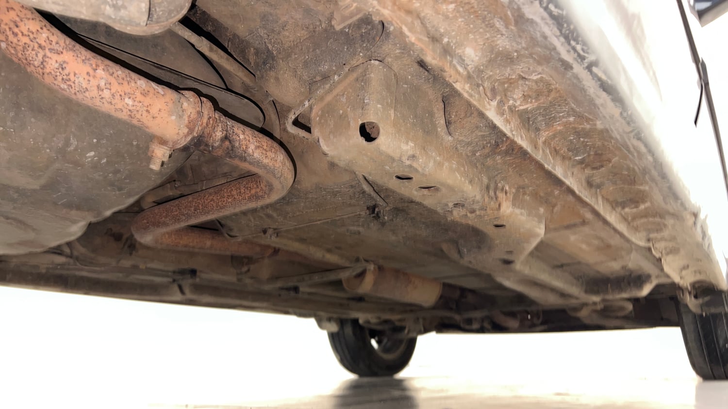Used 2019 Tata Tigor Revotron XZ+ Petrol Manual extra REAR RIGHT UNDERBODY VIEW