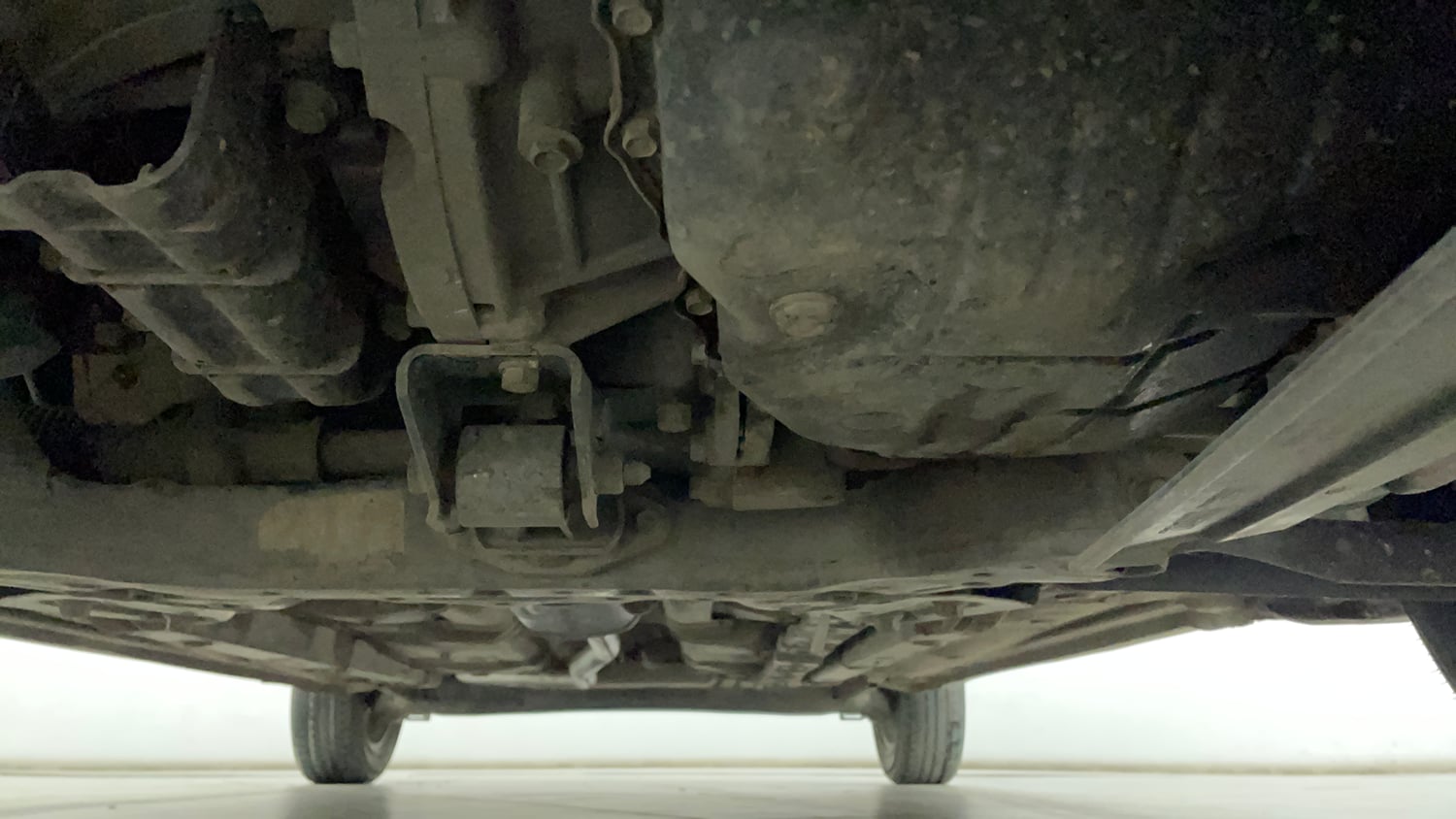 Used 2019 Hyundai Grand i10 Sportz AT 1.2 Kappa VTVT Petrol Automatic extra FRONT LEFT UNDERBODY VIEW