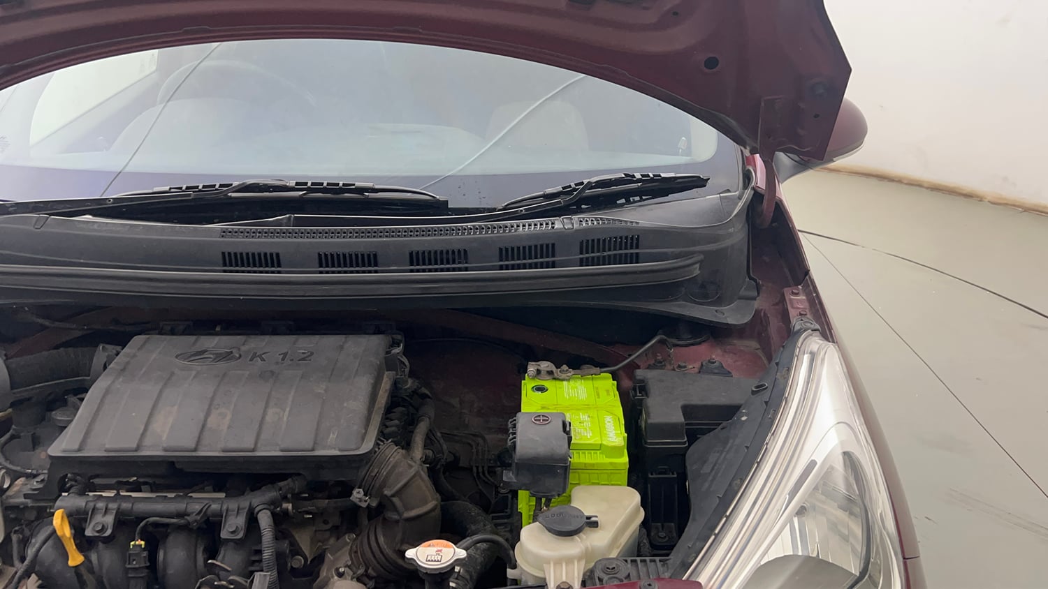Used 2014 Hyundai Grand i10 Sportz 1.2 Kappa VTVT Petrol Manual engine ENGINE LEFT SIDE HINGE & APRON VIEW