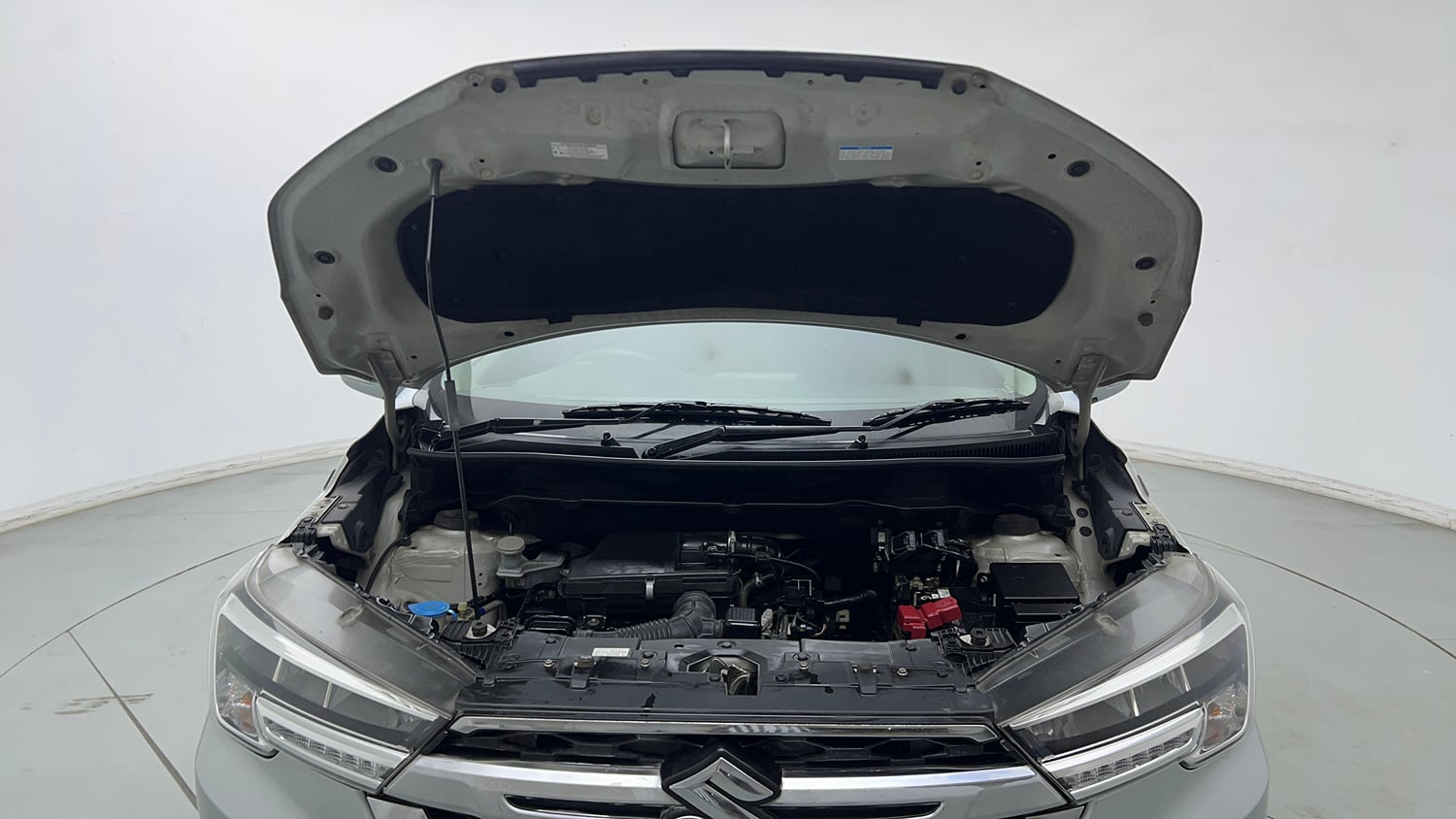 Used 2023 Maruti Suzuki XL6 Zeta AT Petrol Petrol Automatic engine ENGINE & BONNET OPEN FRONT VIEW
