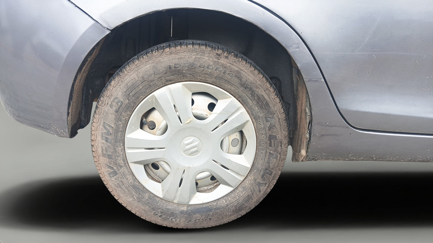 Used 2013 Maruti Suzuki Swift Dzire LXI Petrol Manual tyres RIGHT REAR TYRE RIM VIEW