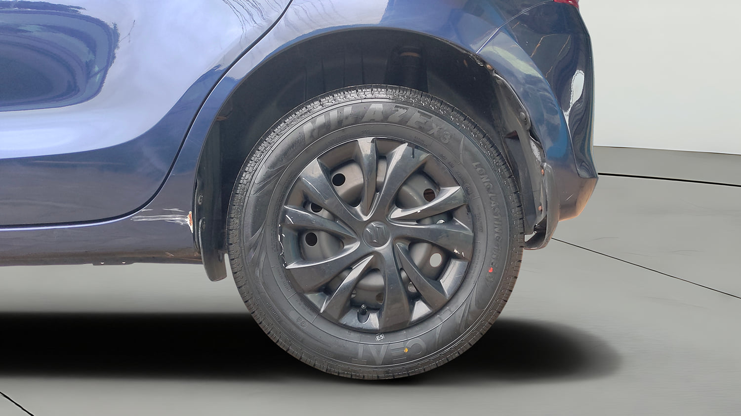 Used 2022 Maruti Suzuki Swift VXi Petrol Manual tyres LEFT REAR TYRE RIM VIEW