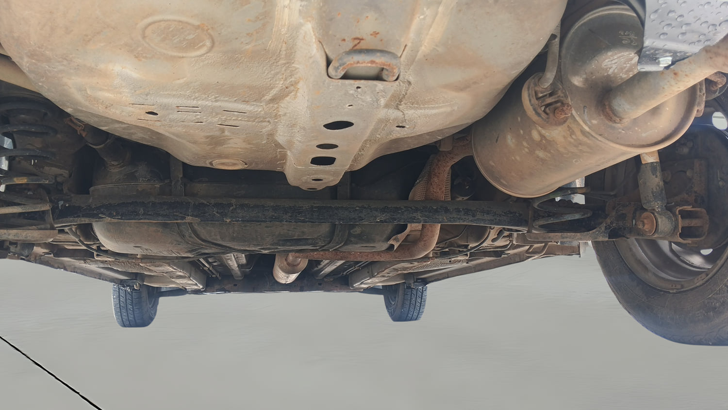 Used 2013 Maruti Suzuki Swift Dzire LXI Petrol Manual extra REAR RIGHT UNDERBODY VIEW