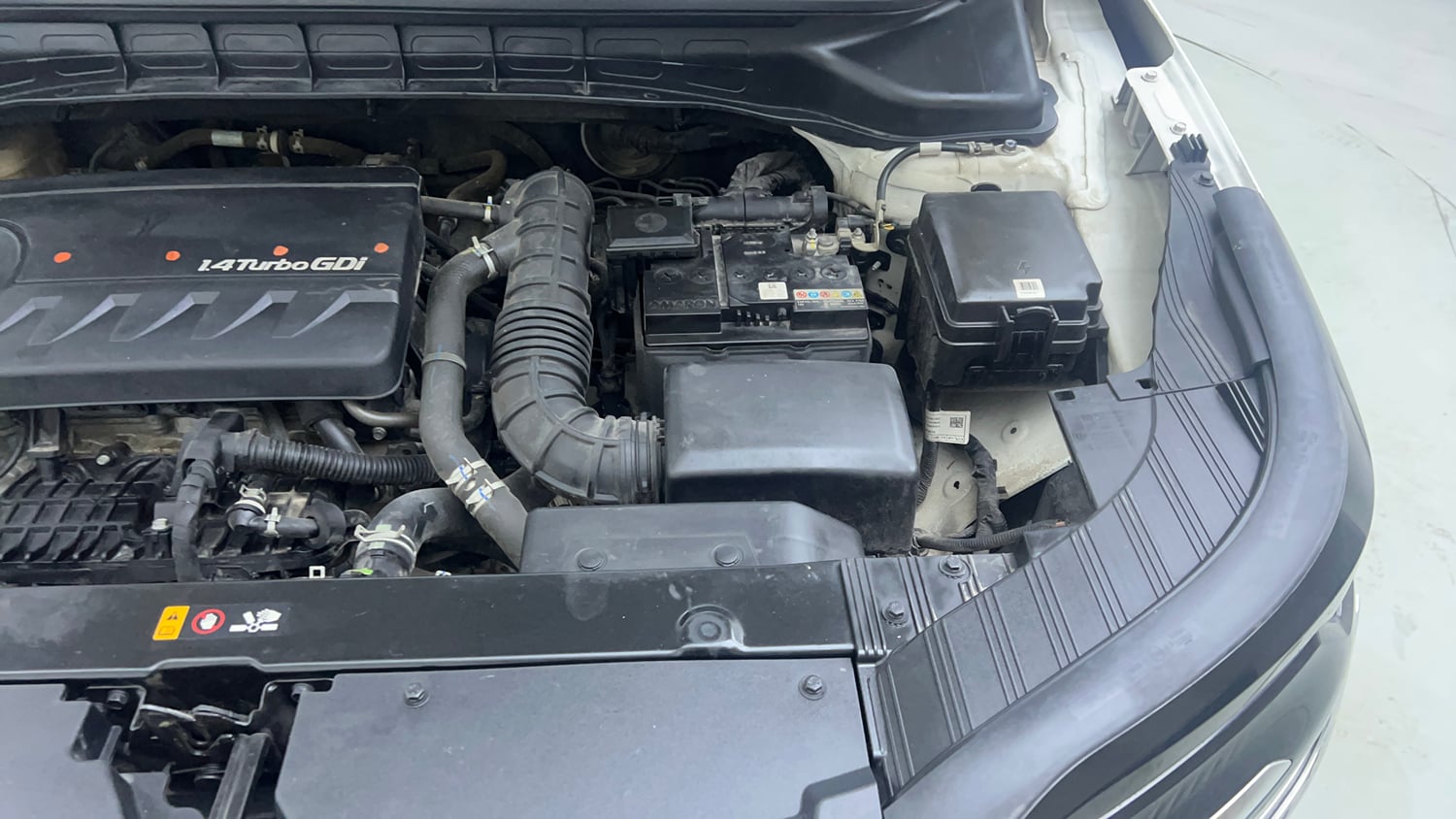 Used 2022 Kia Carens Prestige Plus 1.4 Petrol MT 7 STR Petrol Manual engine ENGINE LEFT SIDE VIEW