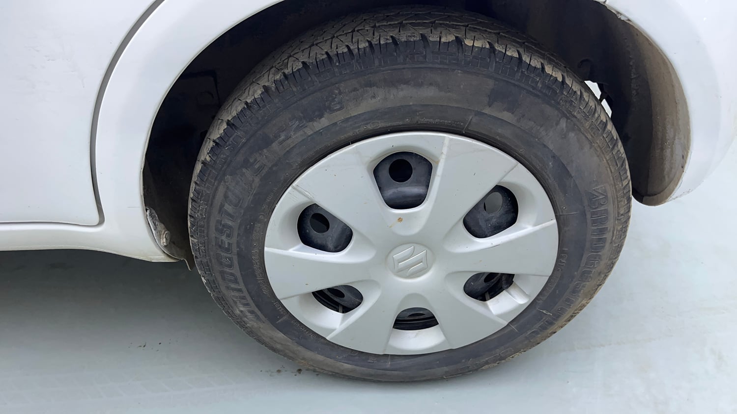 Used 2013 Maruti Suzuki Ritz Vxi BS-IV Petrol Manual tyres LEFT REAR TYRE RIM VIEW