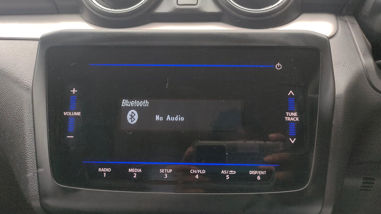 Used 2022 Maruti Suzuki Swift VXi Petrol Manual top_features Integrated (in-dash) music system