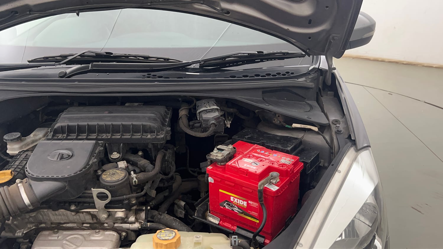 Used 2019 Tata Tiago Revotron XZ Petrol Manual engine ENGINE LEFT SIDE HINGE & APRON VIEW