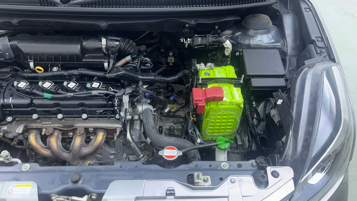 Used 2021 Maruti Suzuki Baleno Zeta Petrol Manual engine ENGINE LEFT SIDE VIEW