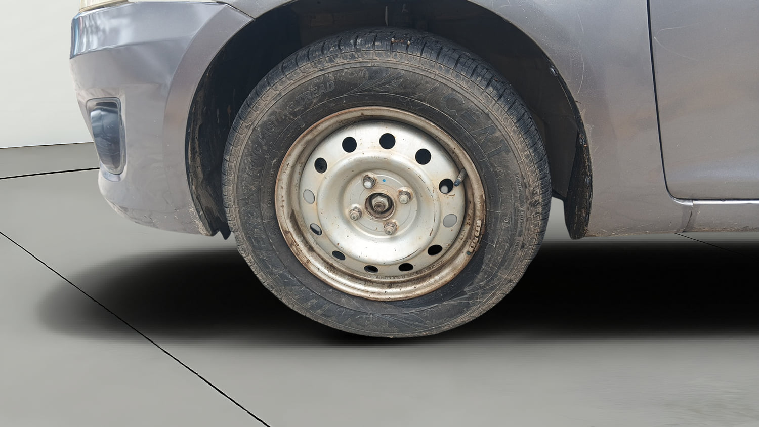Used 2013 Maruti Suzuki Swift Dzire LXI Petrol Manual tyres LEFT FRONT TYRE RIM VIEW
