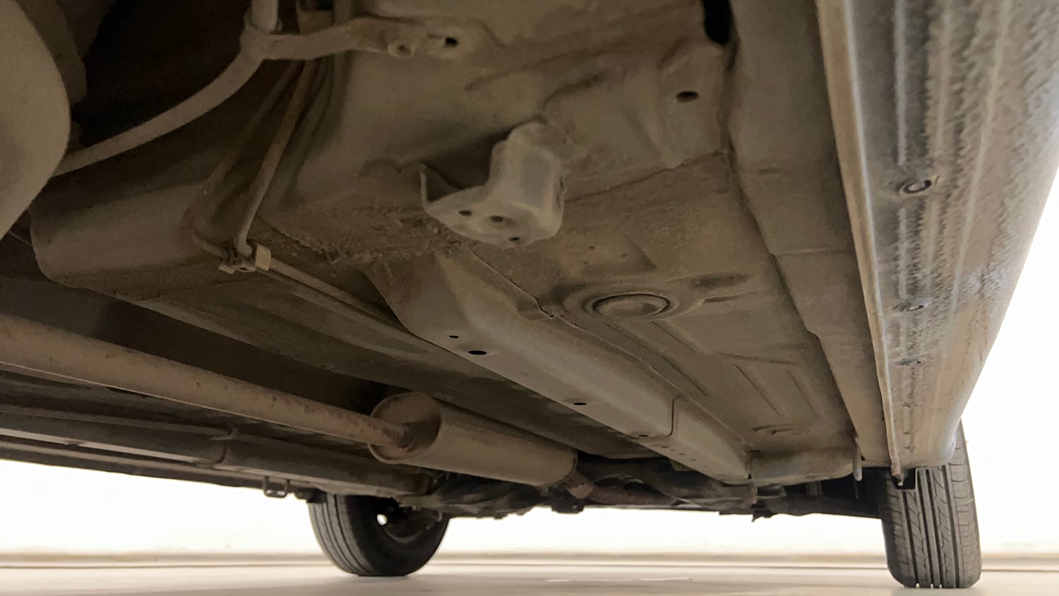 Used 2014 Maruti Suzuki Celerio VXi AMT Petrol Automatic extra REAR RIGHT UNDERBODY VIEW