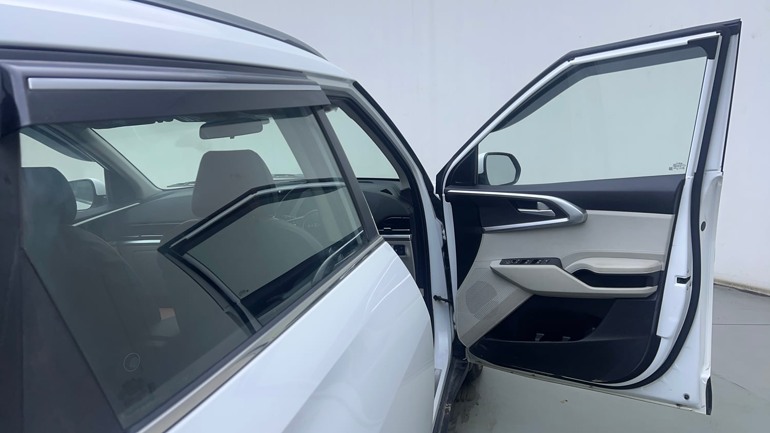 Used 2022 Kia Carens Prestige Plus 1.4 Petrol MT 7 STR Petrol Manual interior RIGHT FRONT DOOR OPEN VIEW