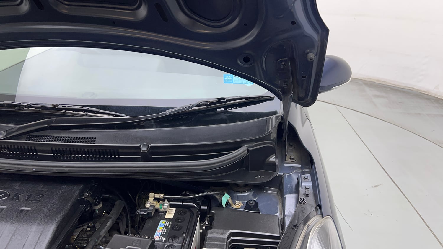 Used 2022 Hyundai Grand i10 Nios Sportz 1.2 Kappa VTVT CNG Cng Manual engine ENGINE LEFT SIDE HINGE & APRON VIEW