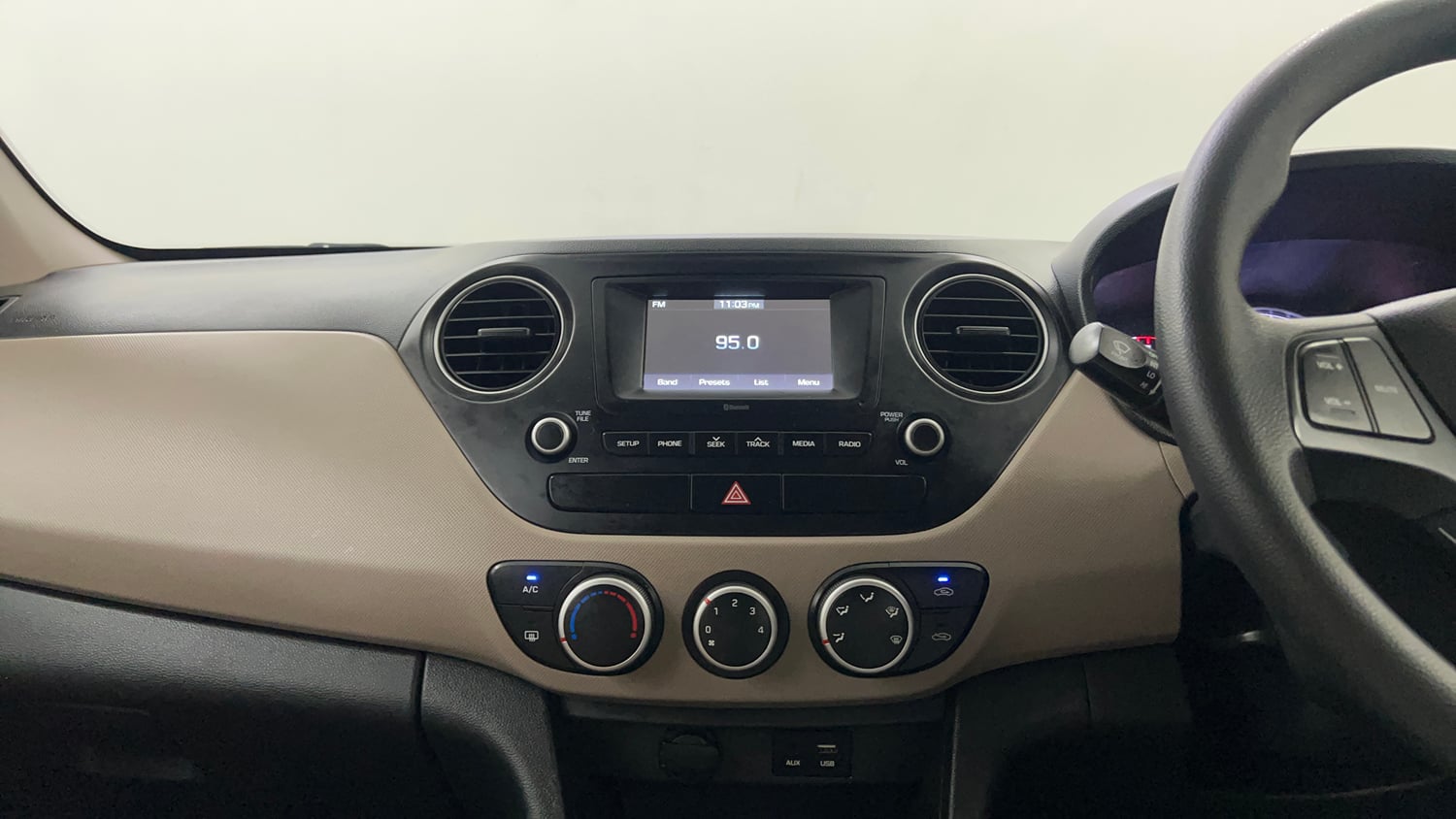 Used 2017 Hyundai Grand i10 Sportz 1.2 Kappa VTVT Petrol Manual interior MUSIC SYSTEM & AC CONTROL VIEW