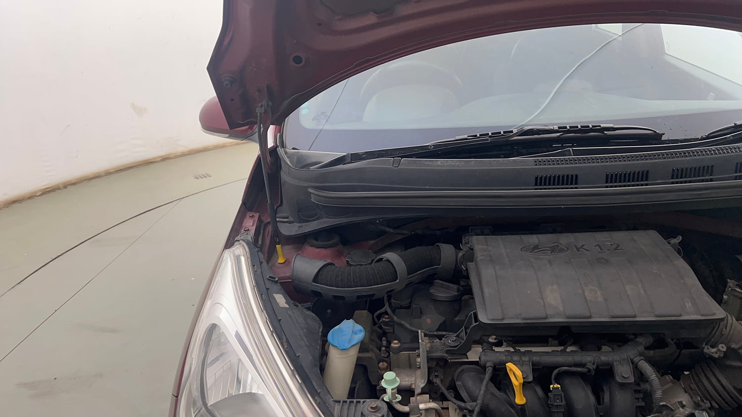 Used 2014 Hyundai Grand i10 Sportz 1.2 Kappa VTVT Petrol Manual engine ENGINE RIGHT SIDE HINGE & APRON VIEW
