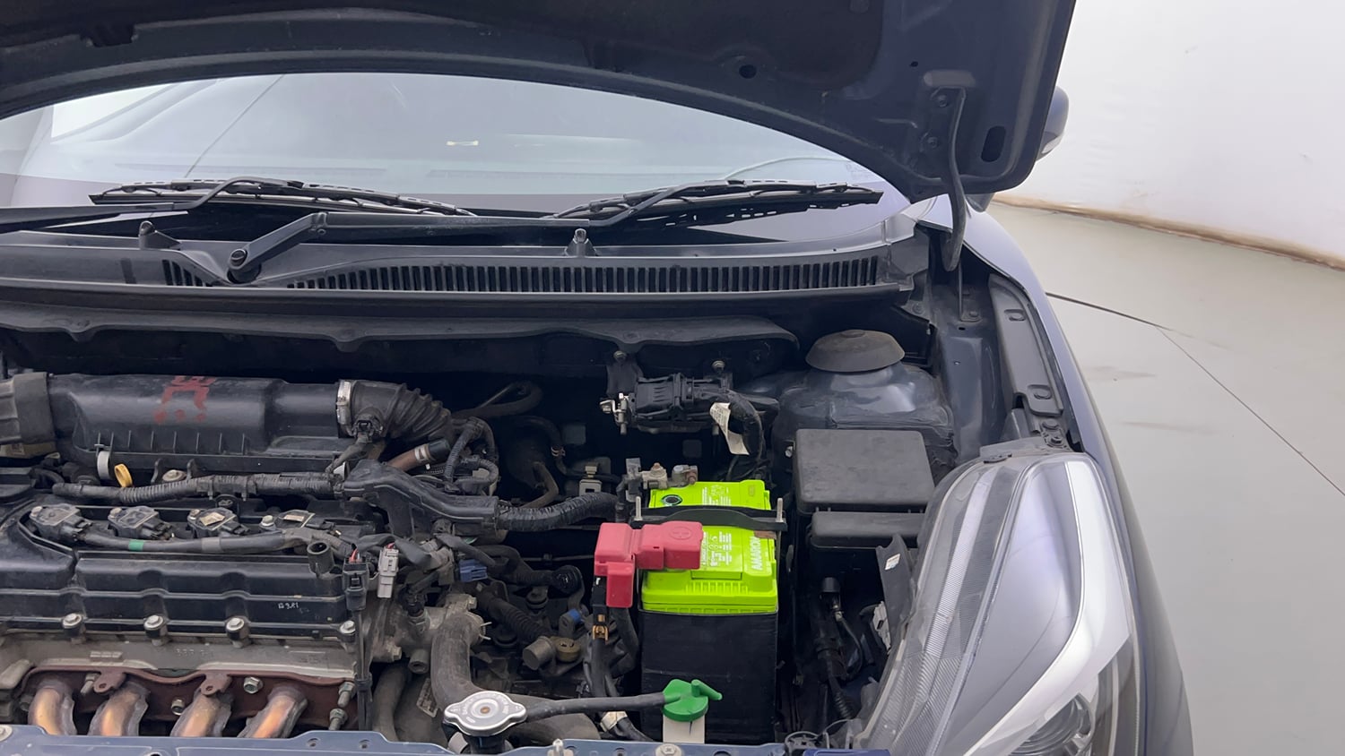 Used 2021 Maruti Suzuki Baleno Delta Petrol Manual engine ENGINE LEFT SIDE HINGE & APRON VIEW