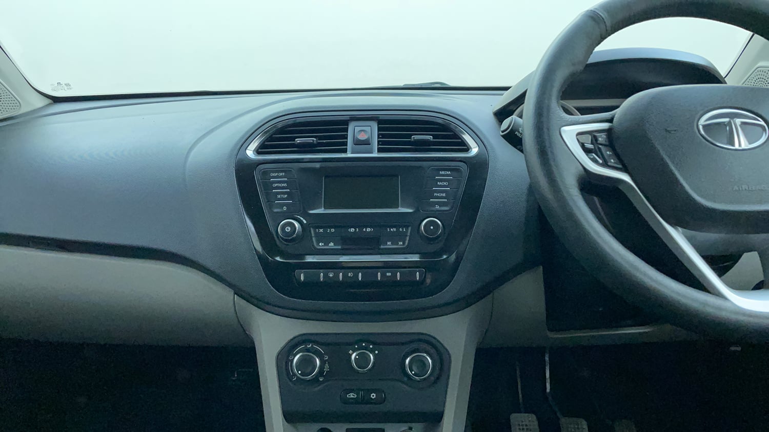 Used 2017 Tata Tiago Revotron XZ Petrol Manual interior MUSIC SYSTEM & AC CONTROL VIEW