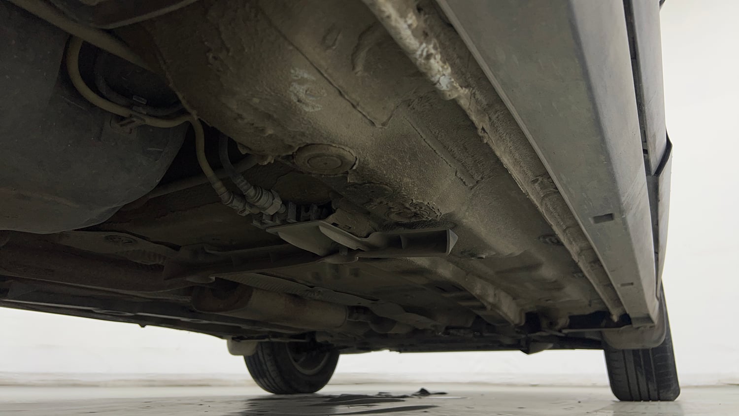 Used 2023 Volkswagen Taigun Highline 1.0 TSI MT Petrol Manual extra REAR RIGHT UNDERBODY VIEW
