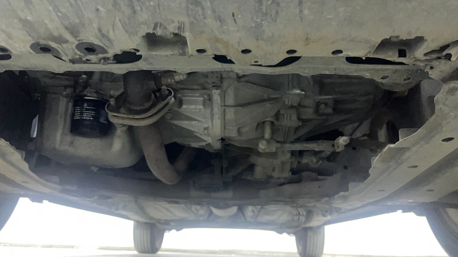 Used 2021 Maruti Suzuki Baleno Zeta Petrol Manual extra FRONT LEFT UNDERBODY VIEW