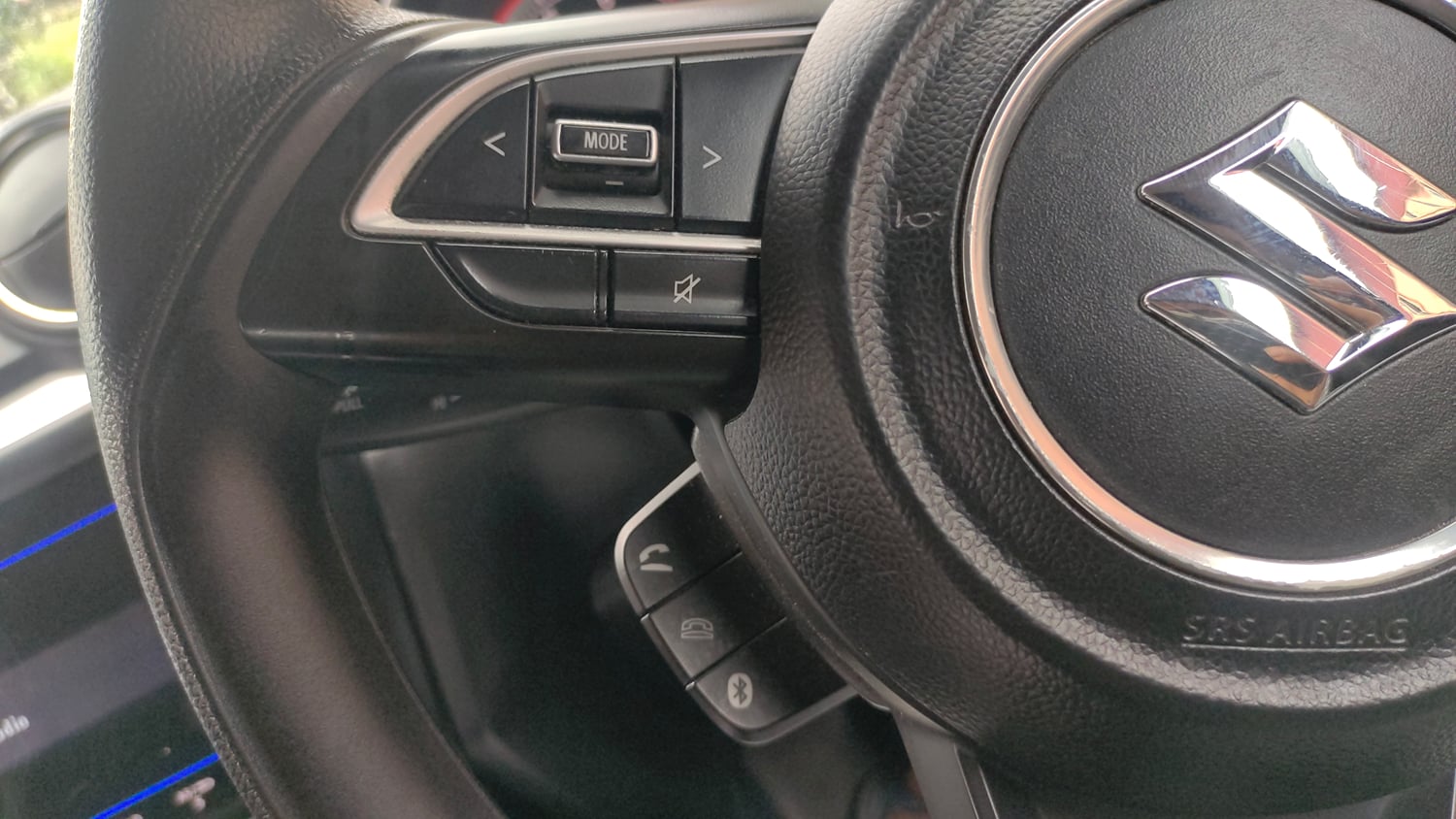 Used 2022 Maruti Suzuki Swift VXi Petrol Manual top_features Steering mounted controls