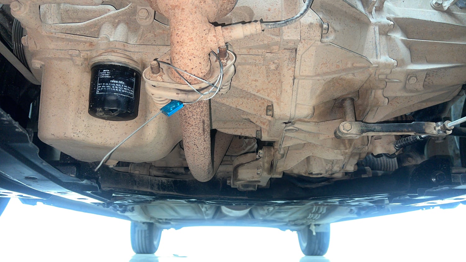 Used 2021 Maruti Suzuki Baleno Zeta Petrol Manual extra FRONT LEFT UNDERBODY VIEW