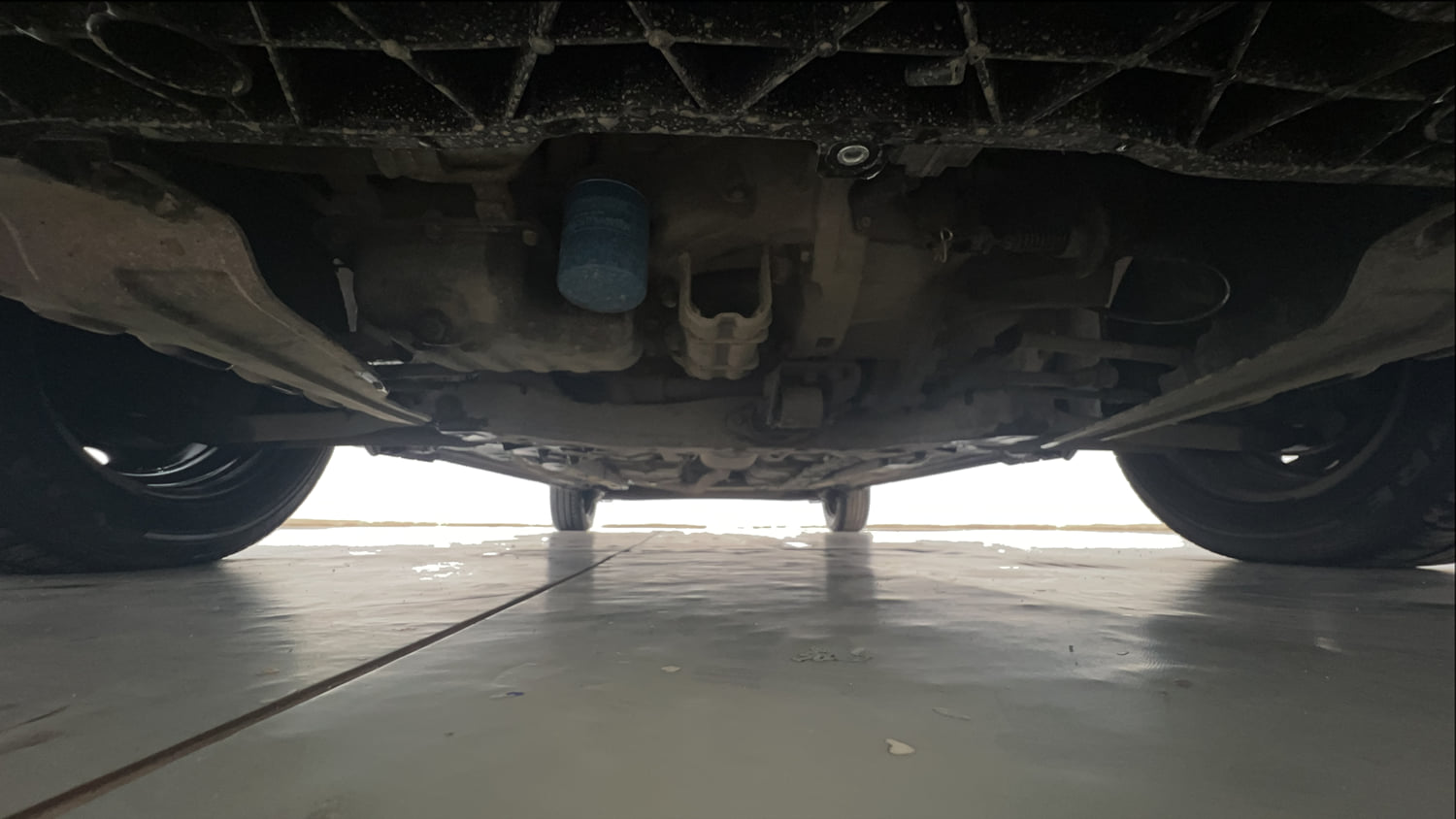 Used 2014 Hyundai Grand i10 Sportz 1.2 Kappa VTVT Petrol Manual extra FRONT LEFT UNDERBODY VIEW