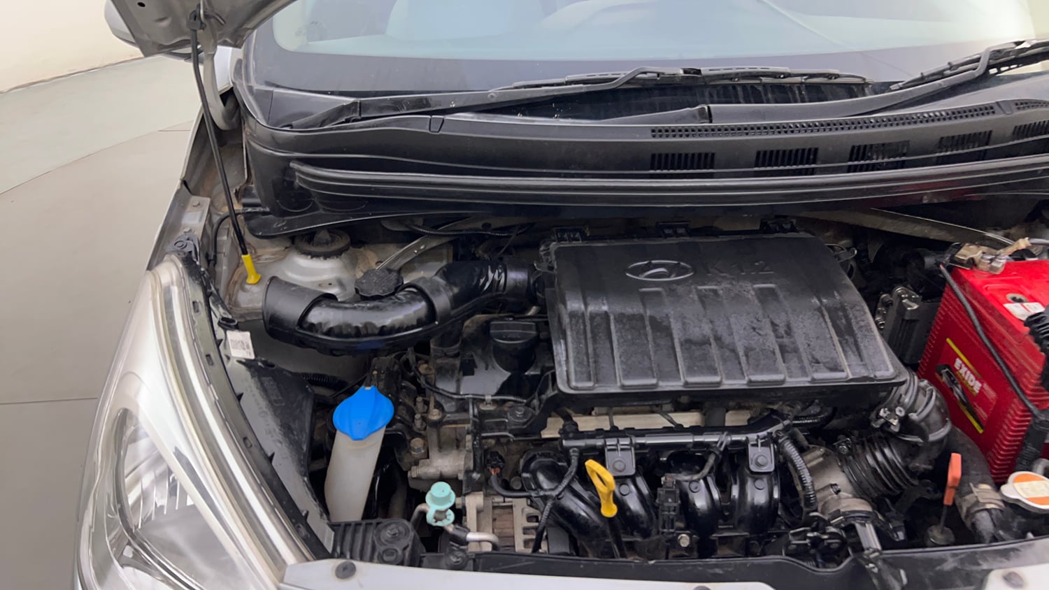 Used 2018 Hyundai Grand i10 Magna AT 1.2 Kappa VTVT Petrol Automatic engine ENGINE RIGHT SIDE HINGE & APRON VIEW
