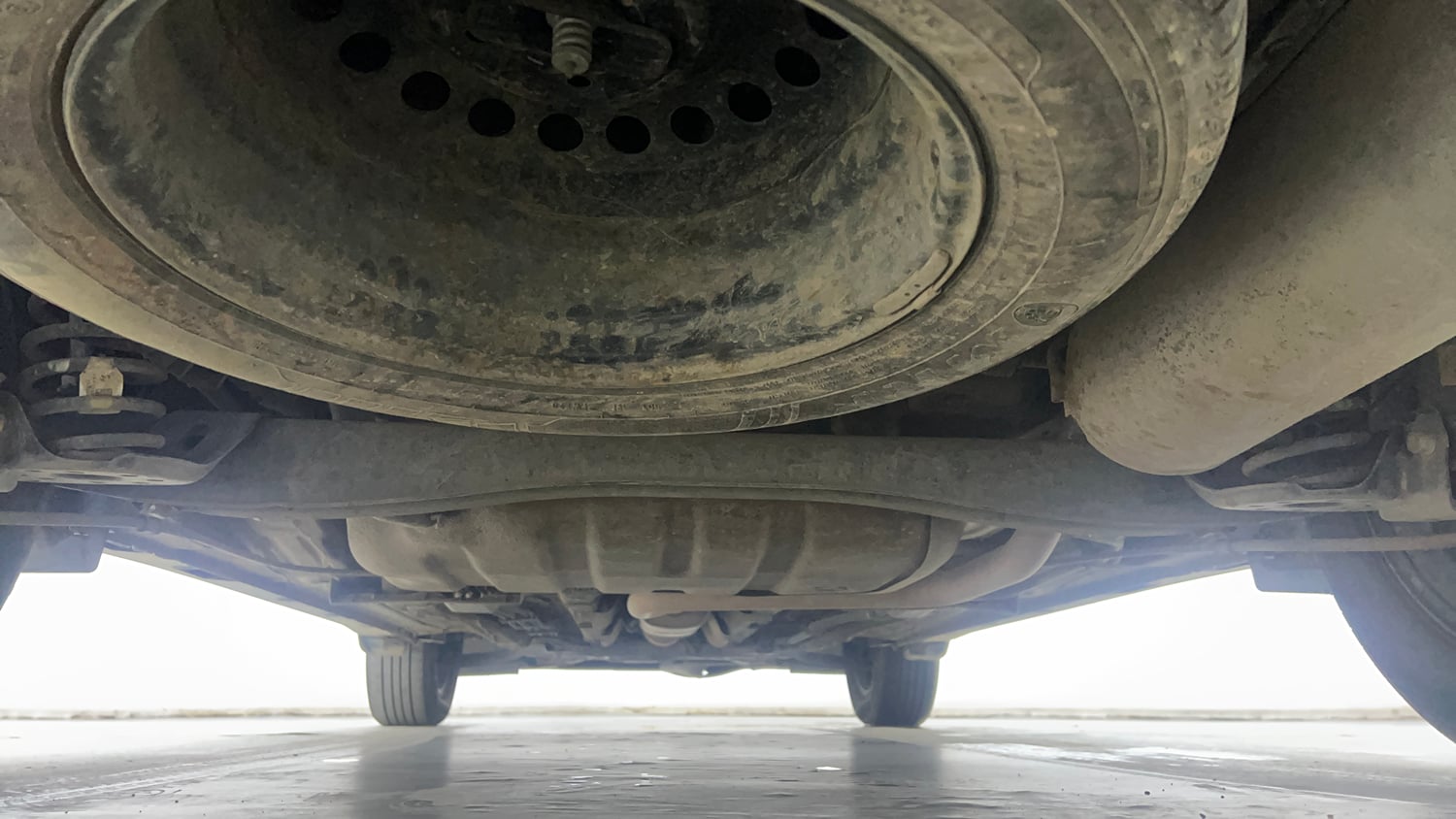 Used 2022 Kia Carens Prestige Plus 1.4 Petrol MT 7 STR Petrol Manual extra REAR UNDERBODY VIEW (TAKEN FROM REAR)