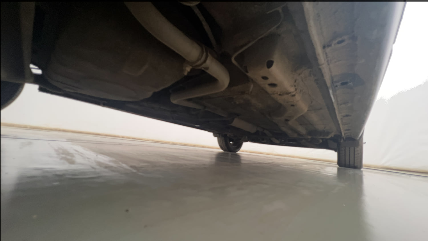 Used 2019 Tata Tiago Revotron XZ Petrol Manual extra REAR RIGHT UNDERBODY VIEW