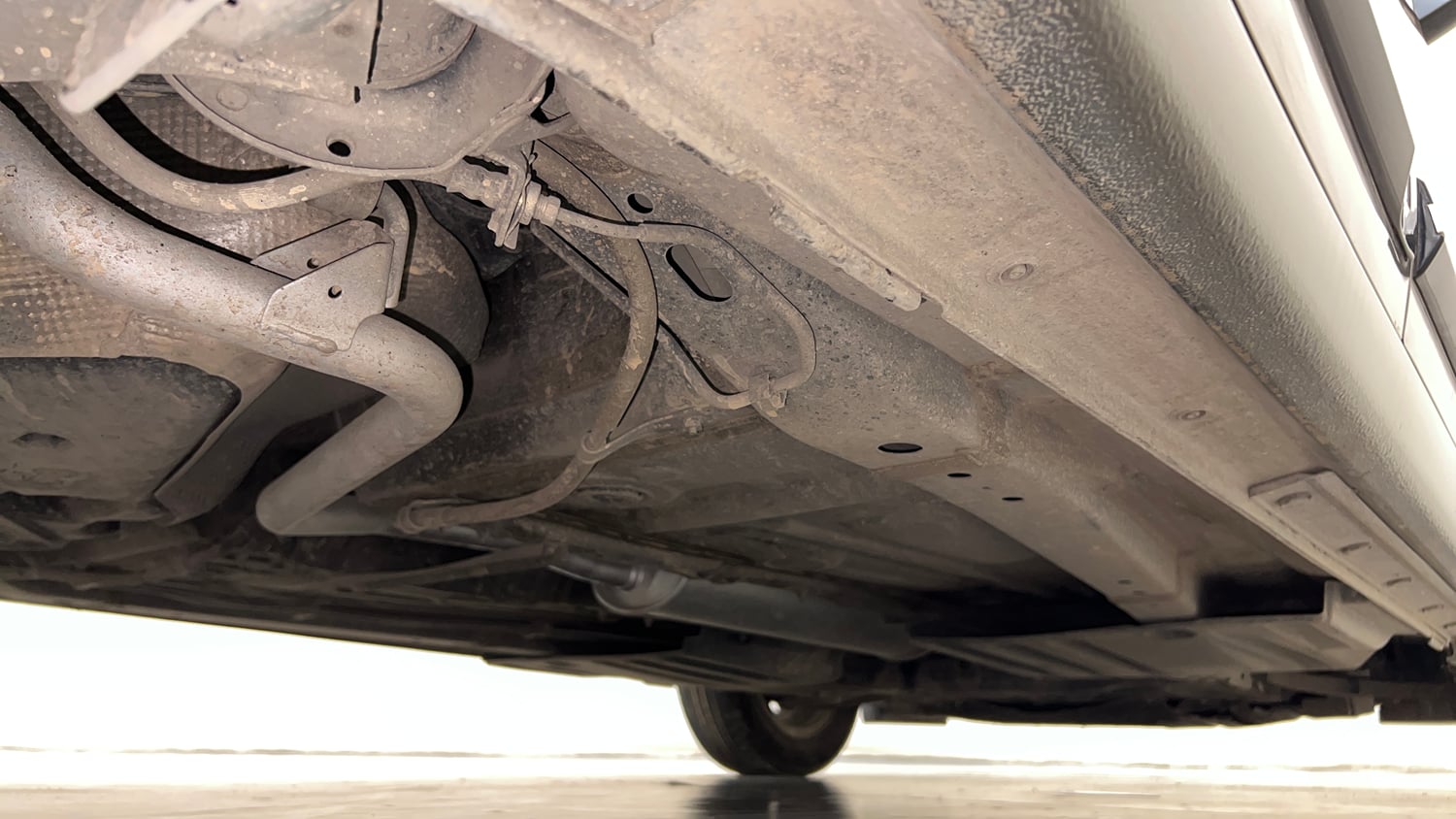 Used 2022 Maruti Suzuki Dzire ZXi Plus AGS Petrol Automatic extra REAR RIGHT UNDERBODY VIEW