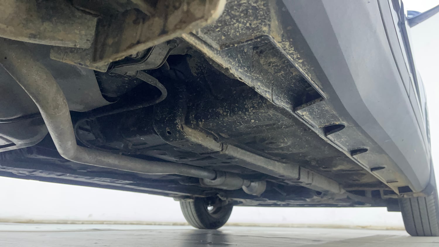 Used 2024 Hyundai Exter SX (O) 1.2 AMT Petrol Automatic extra REAR RIGHT UNDERBODY VIEW