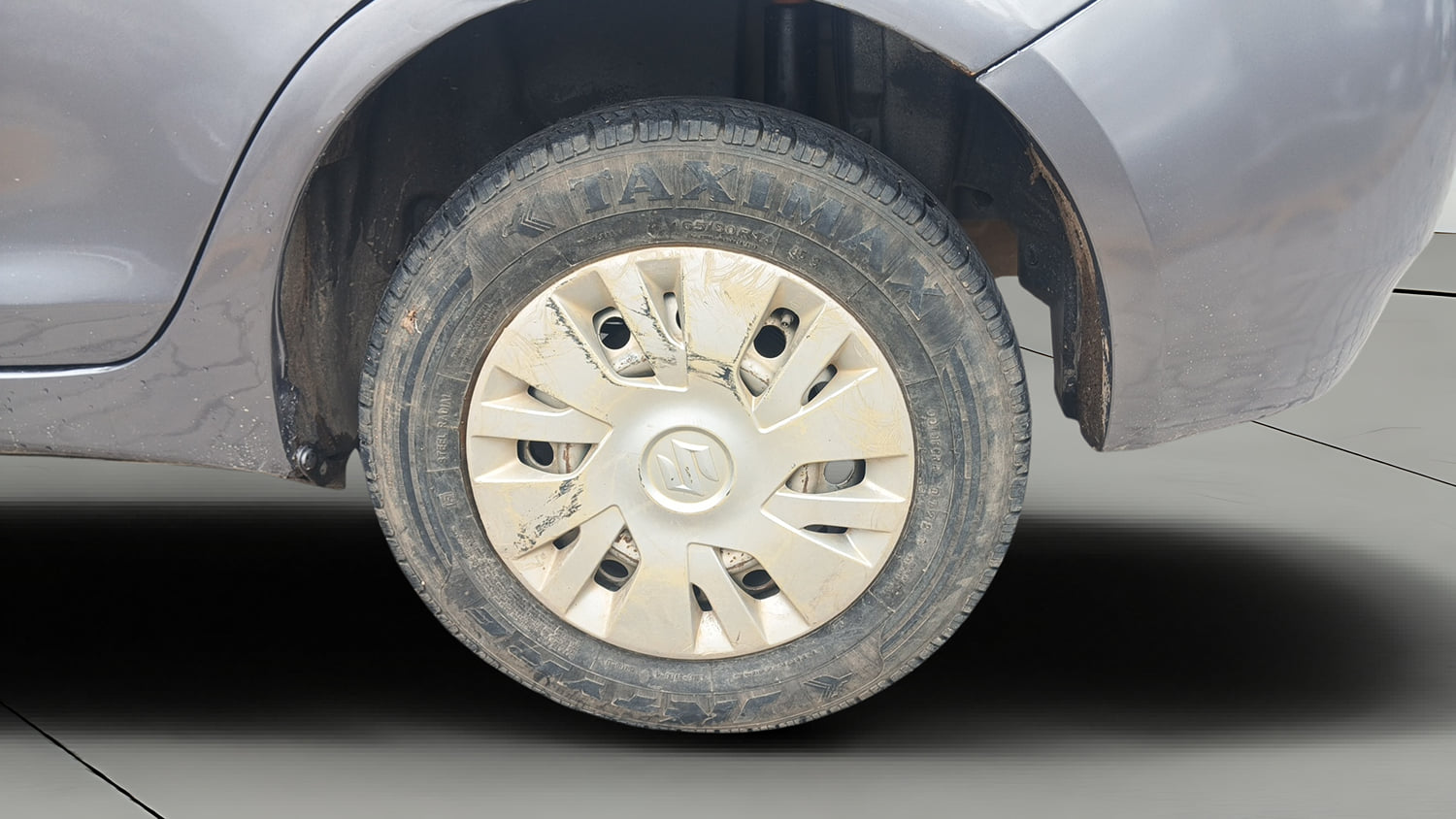 Used 2013 Maruti Suzuki Swift Dzire LXI Petrol Manual tyres LEFT REAR TYRE RIM VIEW