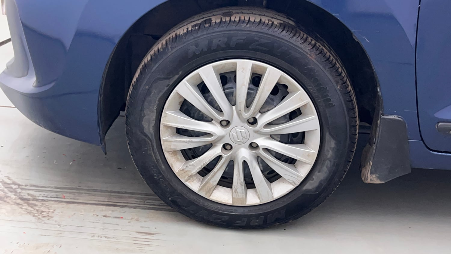 Used 2021 Maruti Suzuki Baleno Delta Petrol Manual tyres LEFT FRONT TYRE RIM VIEW