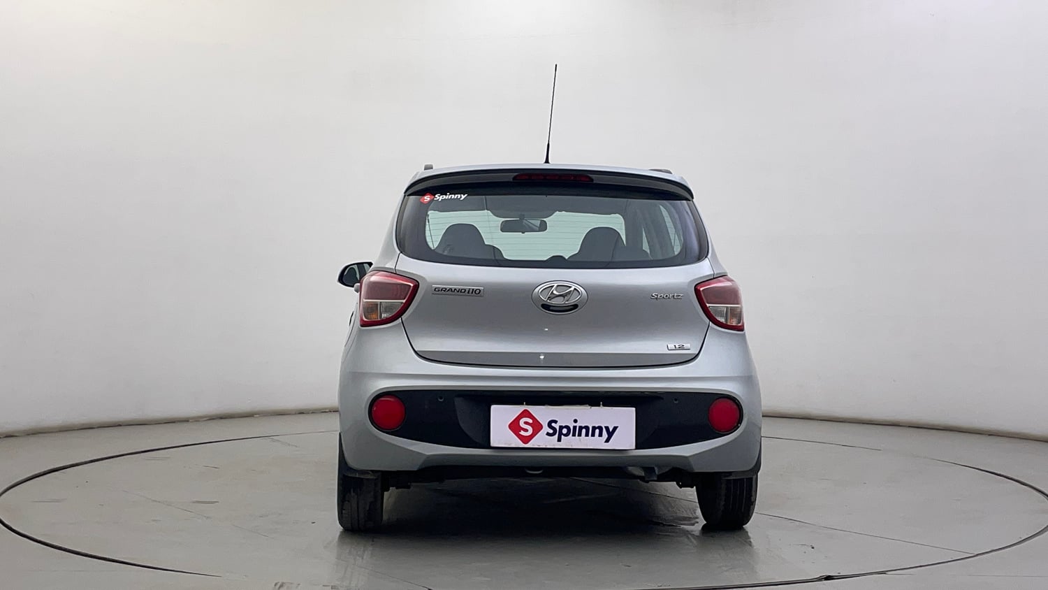 Used 2019 Hyundai Grand i10 Sportz AT 1.2 Kappa VTVT Petrol Automatic exterior BACK VIEW