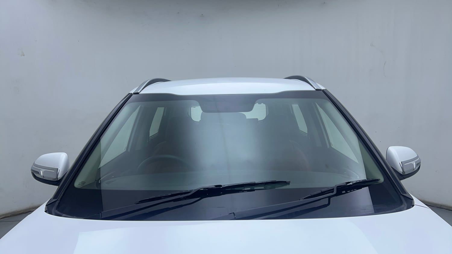 Used 2022 Kia Carens Prestige Plus 1.4 Petrol MT 7 STR Petrol Manual exterior FRONT WINDSHIELD VIEW