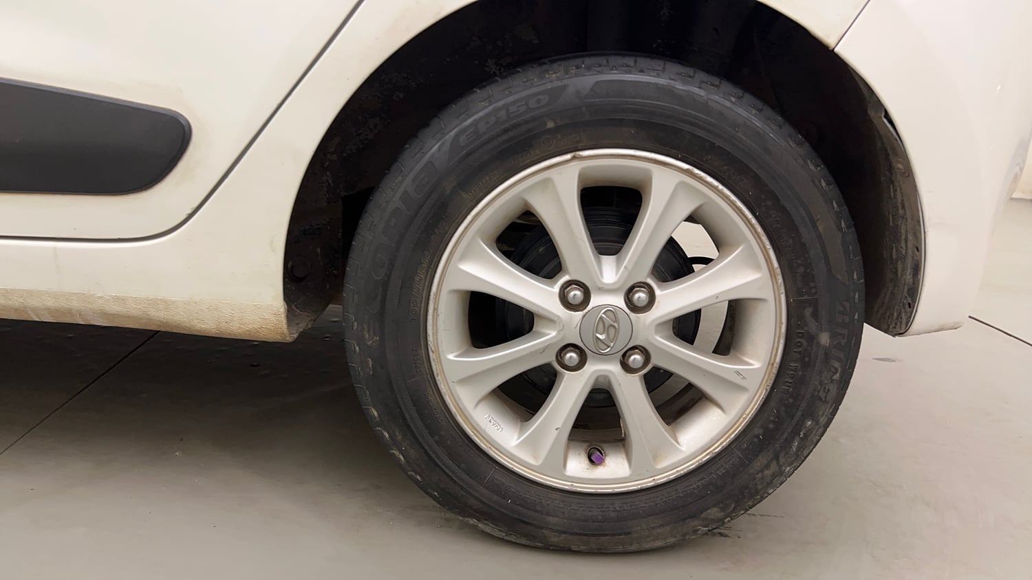 Used 2013 Hyundai Grand i10 Asta AT 1.2 Kappa VTVT Petrol Automatic tyres LEFT REAR TYRE RIM VIEW