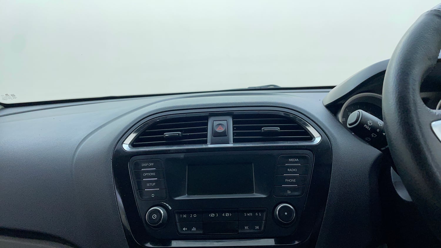 Used 2017 Tata Tiago Revotron XZ Petrol Manual top_features Integrated (in-dash) music system
