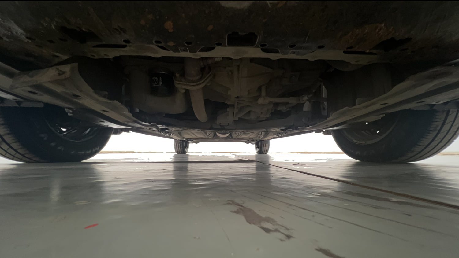 Used 2021 Maruti Suzuki Baleno Delta Petrol Manual extra FRONT LEFT UNDERBODY VIEW